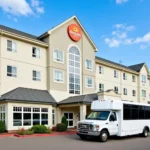 Budget-friendly hotel exterior with airport shuttle