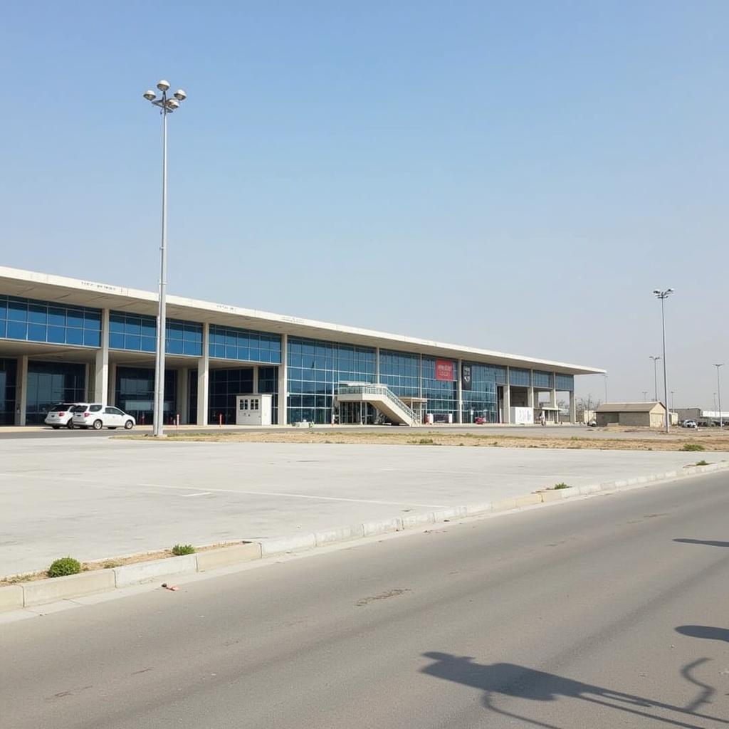 A.A. Ansari Bhuntar Airport Terminal: A view of the A.A. Ansari Bhuntar Airport terminal, showing its modest size and facilities available to passengers.