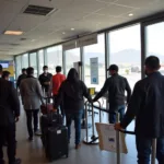 Passengers completing arrival procedures at Leh Airport