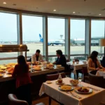 Dining area within Pune Airport's international lounge