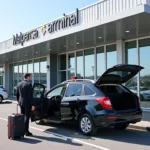 Taxi waiting outside Malpensa Airport for passengers heading to Milan Centrale