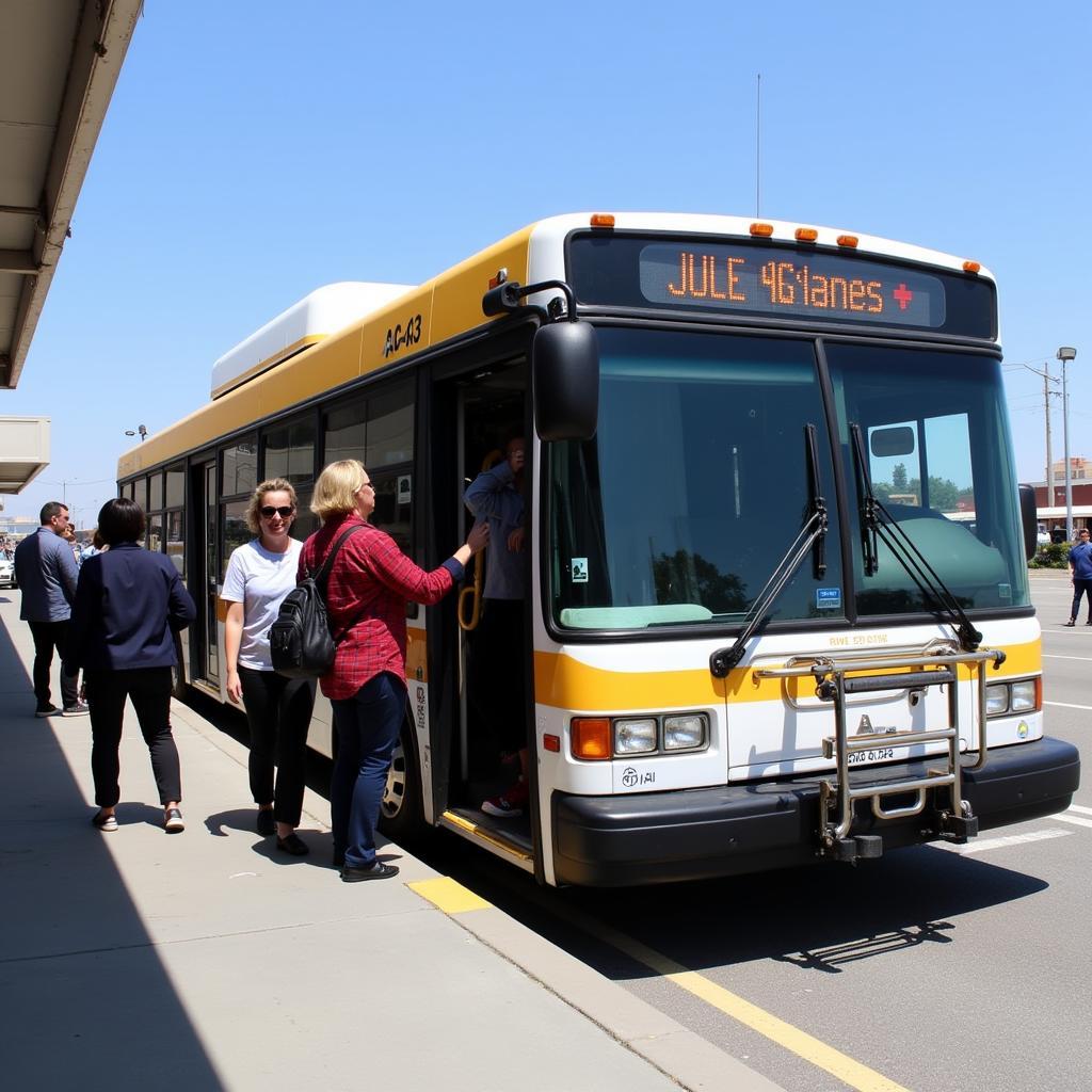 Passengers Boarding the AC 43 Bus at the Airport