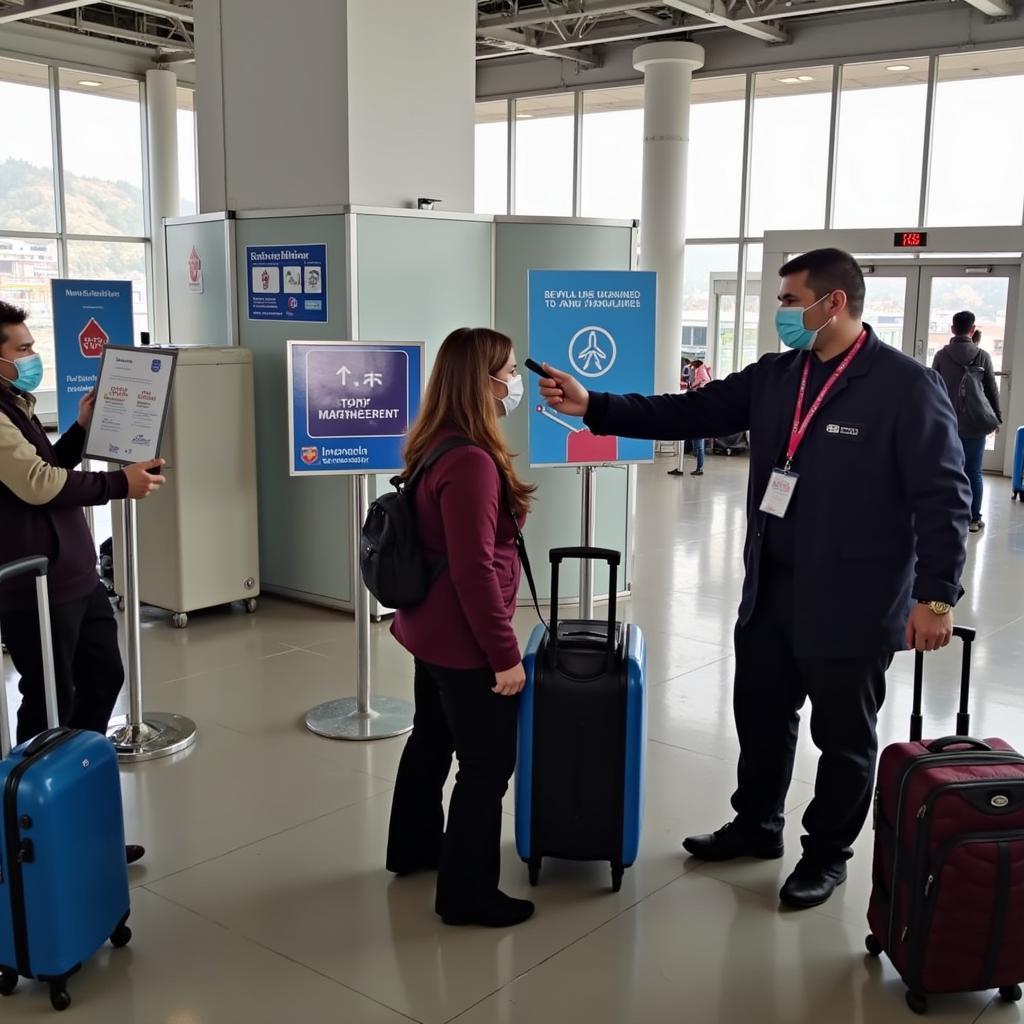 Passengers undergoing thermal screening at Srinagar Airport